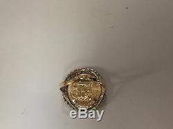 14K Gold 21 MM COIN RING with a 22K 1/10 OZ AMERICAN EAGLE COIN WITH. 25 TCW