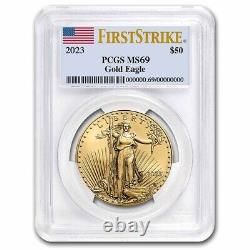 2023 1 oz American Gold Eagle MS-69 PCGS (FirstStrike) in French would be: 
2023 1 once Aigle d'or américain MS-69 PCGS (FirstStrike)