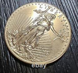 Pièce de monnaie en or américaine American Gold Eagle de 1 once, non circulée et brillante, de 2013, d'une valeur de 50 dollars.
